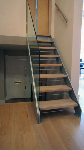 Powder Coated Aluminium and Steel, European Oak Treads with 12mmm Toughened Glass Balustrades